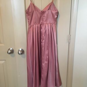 Mauve knee length dress.